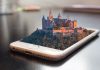 3D design of a castle with nature on a smartphone