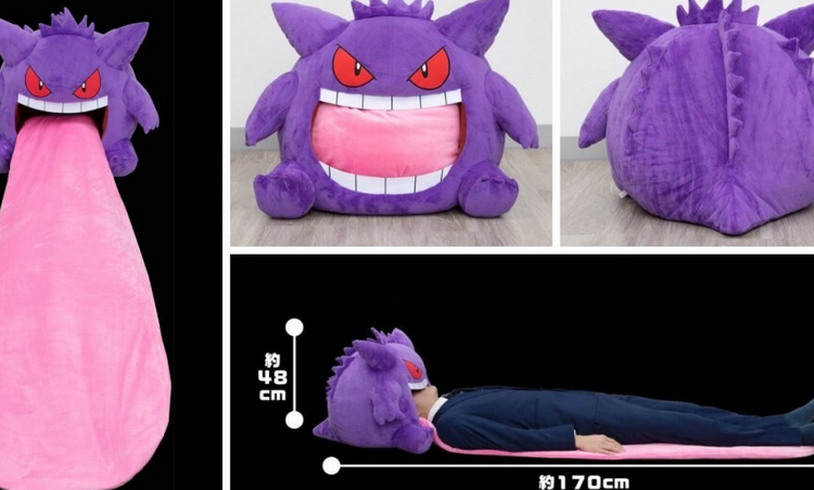 When you think youve seen it all Pokemon arrives and throws a Gengar plush with a roll up tongue to take a nap on